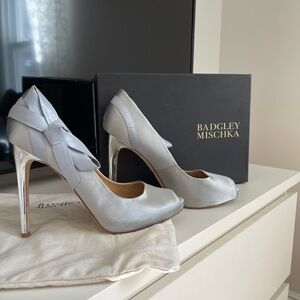 Badgley Mischka silver satin heels. Platform with peep toe, 4inch heel. Size 8.5